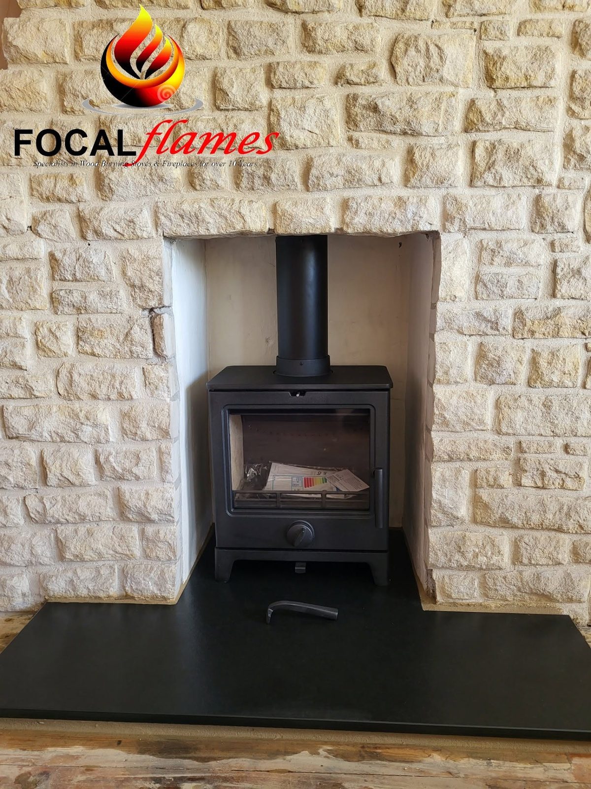 A stove set into an opened-up stone recess