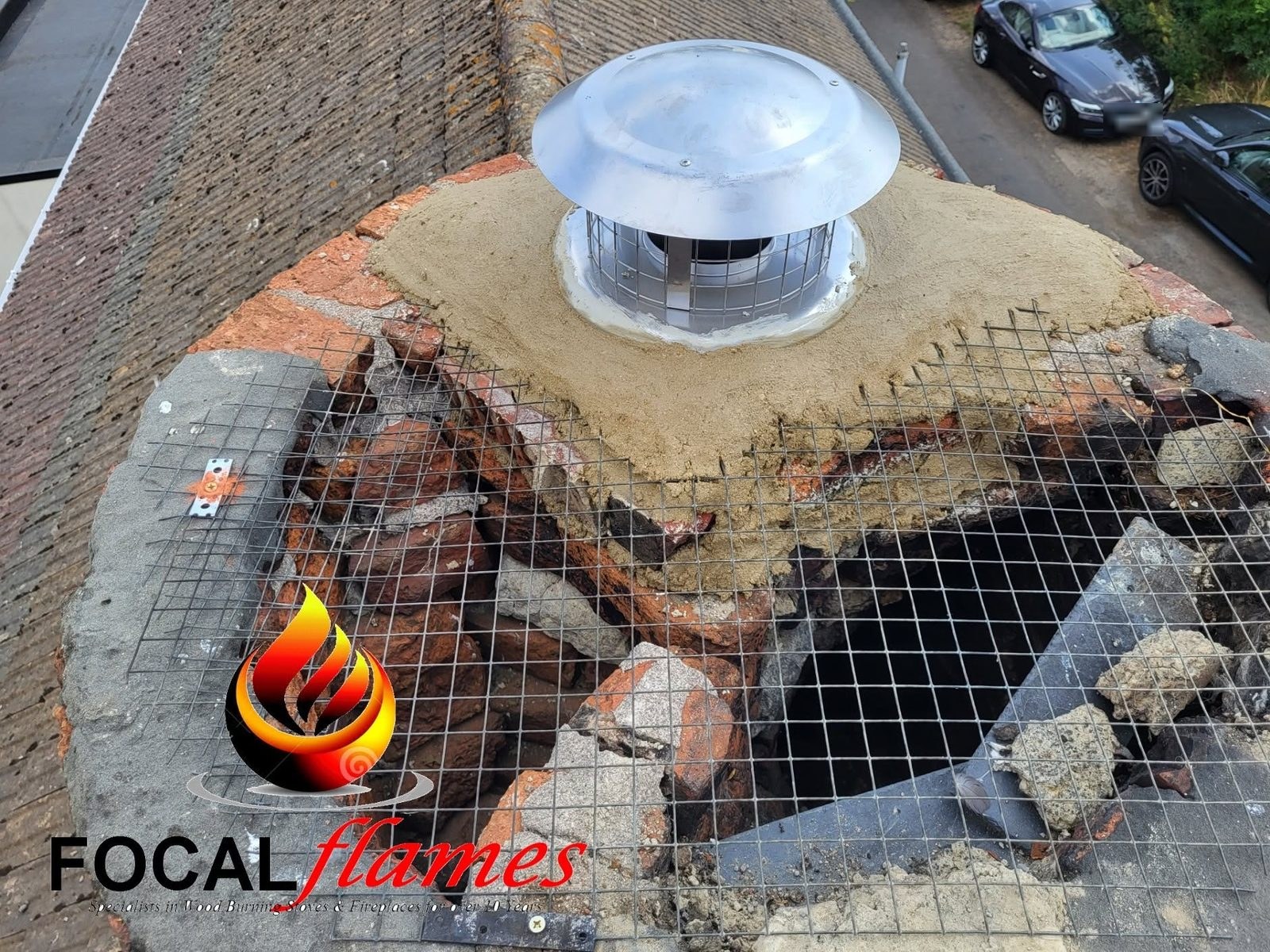A new cowl fitted on a chimney with fresh flaunching round it